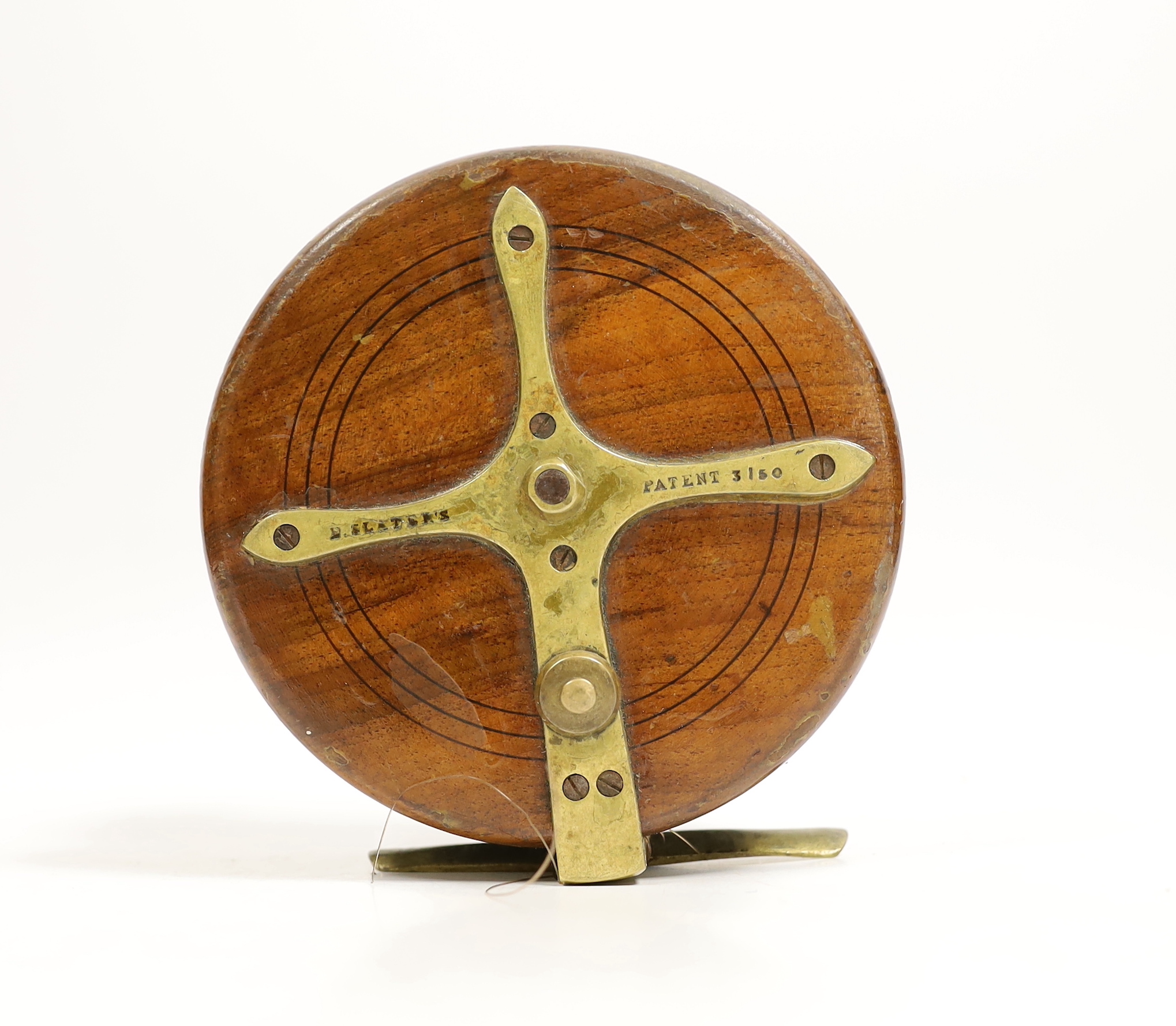 A David Slater patent five inch Starback centre pin fishing reel, brass mounted walnut with twin horn handles and drum release catch